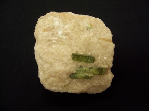 Apatite on calcite. Wilberforce, Ontario, Canada.
