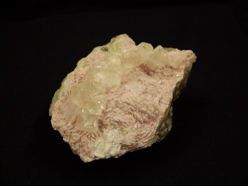 Calcite on cobaltian dolomite. Tsumeb, Namibia.