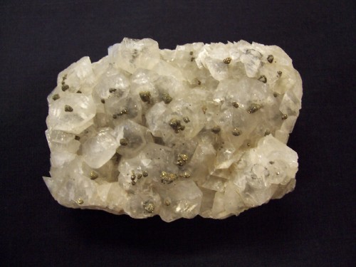 Calcite with pyrite. McLeod Mine, Wawa, Ontario, Canada.