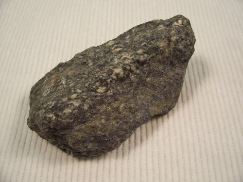 Holmquistite w/ Titanite & Zinwaldite. Quebec Lithium Mines, Preissac, Quebec, Canada.
